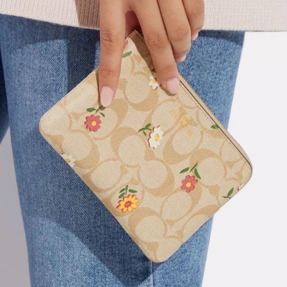 Coach Corner Zip Wristlet in signature coated canvas with ditsy floral print NWT